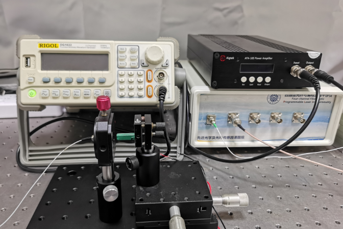 功率放大器在光纤白光干涉的微振动绝对测量中的应用